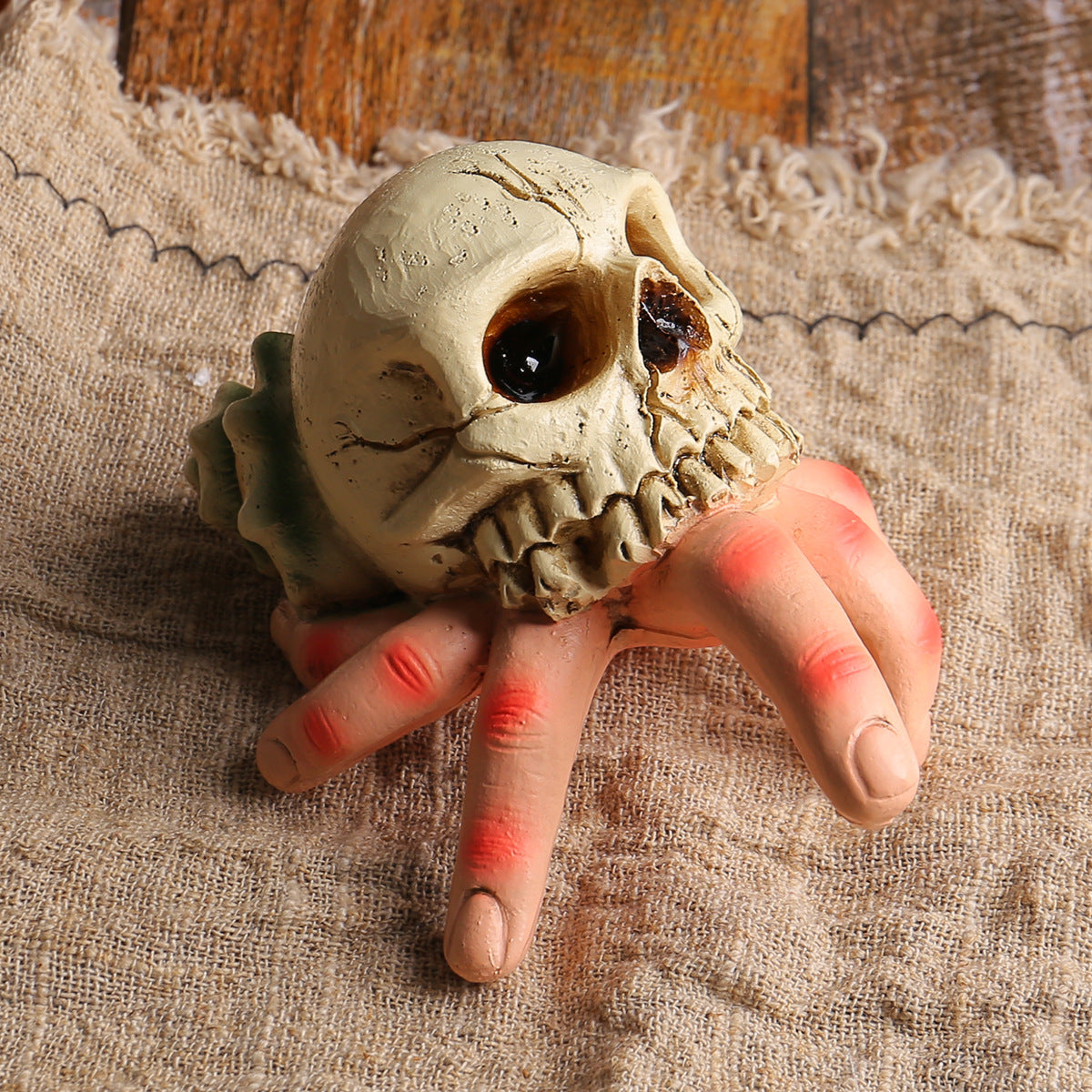 Skull Simulated Hand Figurine